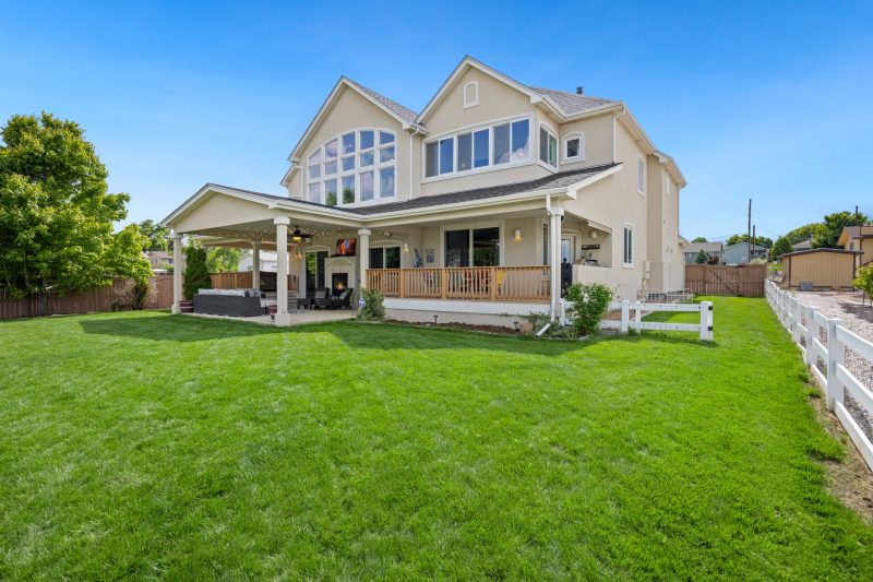 Home 13 Beautiful twostory suburban house with a large green lawn an 1783443846